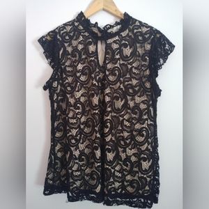 Back and Creme blouse